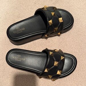 Valentino Garavani Black Sandals with Gold Studs